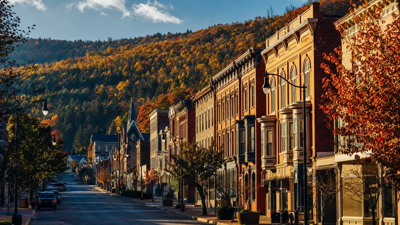 Victorian brick storefronts with forested ridges in autumn, Monroe County, PA (Poconos) Business License